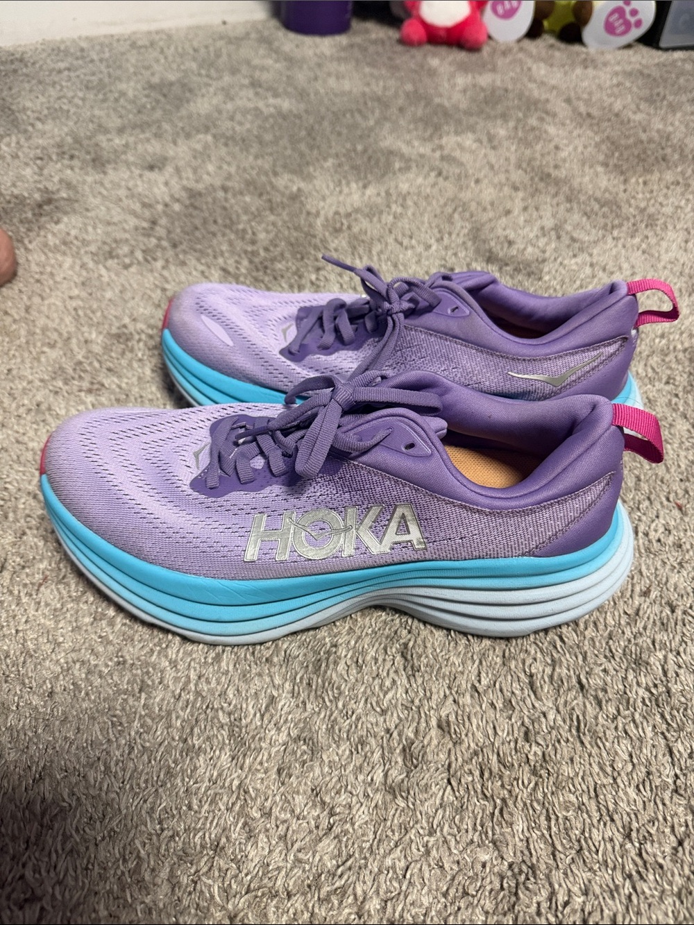 Hoka Lavender Athletic Running Shoes with Blue Midsole and Pink Pull Tab